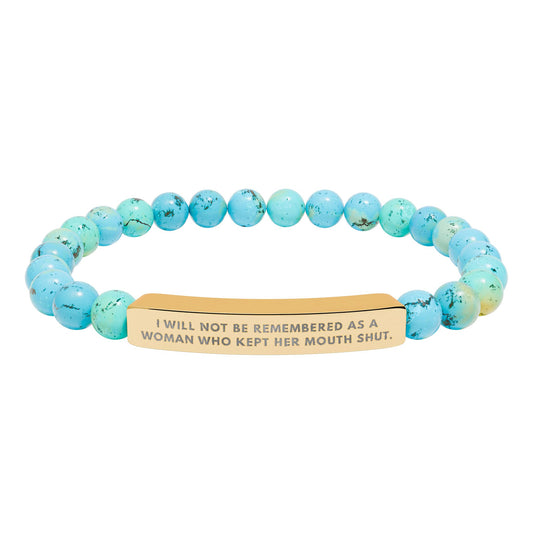 Turquoise beaded Feminist mantra bracelet with an engraved gold bar featuring an inspirational quote, ‘I will not be remembered as a woman who kept her mouth shut’ – empowering jewelry for women